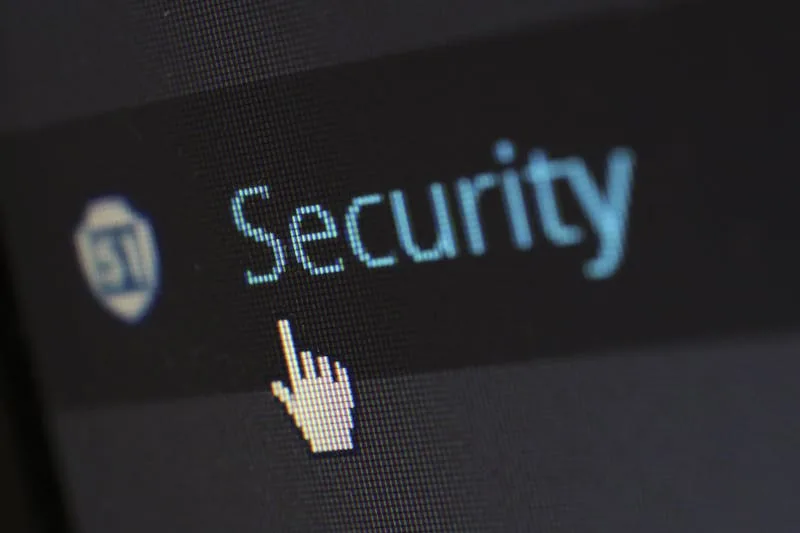 Laptop and documents about privacy in workplace health management